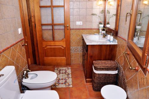 Kúpeľňa v ubytovaní Casa rural Ravalet 21