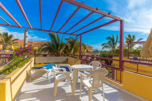 Μπαλκόνι ή βεράντα στο Bungalows Maspalomas Oasis Club - All Inclusive.