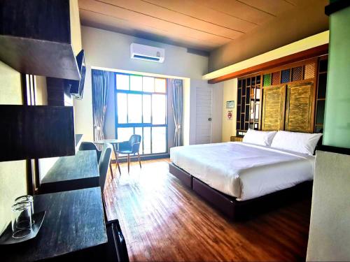 Katil atau katil-katil dalam bilik di PS Thungsao Hotel