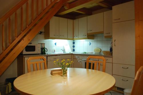 Η κουζίνα ή μικρή κουζίνα στο Sun Matrei Apartments