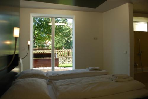 Ένα ή περισσότερα κρεβάτια σε δωμάτιο στο Sun Matrei Apartments