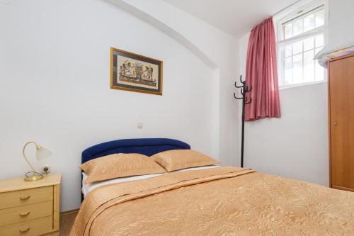 Postel nebo postele na pokoji v ubytování Apartment Pauk Split