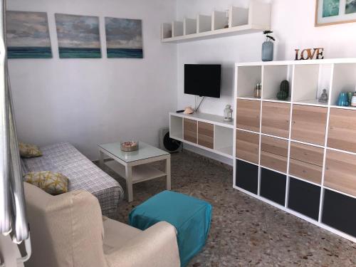 TV a/nebo společenská místnost v ubytování apartamento el levante