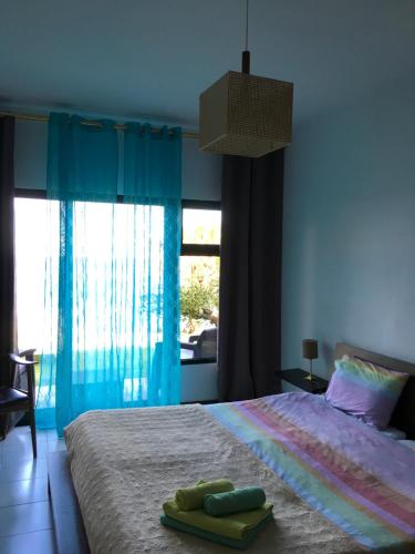 En eller flere senge i et værelse på See to Sea