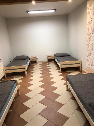 Postel nebo postele na pokoji v ubytování Apartament dla 4 osób
