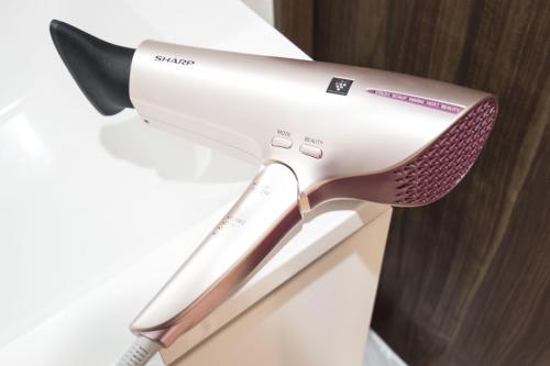 a hair dryer on top of a refrigerator at Nakamuraya Kyoto Enmachi Momiji in Kyoto
