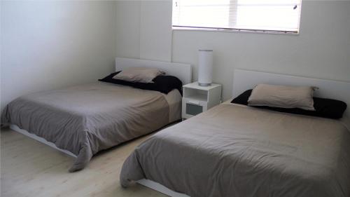 Un pat sau paturi într-o cameră la THE TIDES on MIAMI HOLLYWOOD