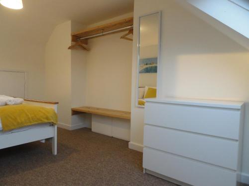 Postelja oz. postelje v sobi nastanitve Luckwell Too by Cliftonvalley Apartments