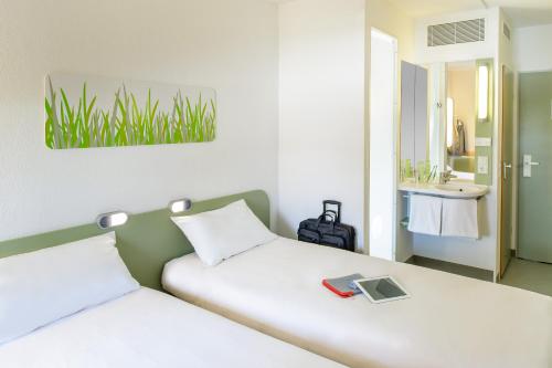 ibis budget Karlsruheにあるベッド