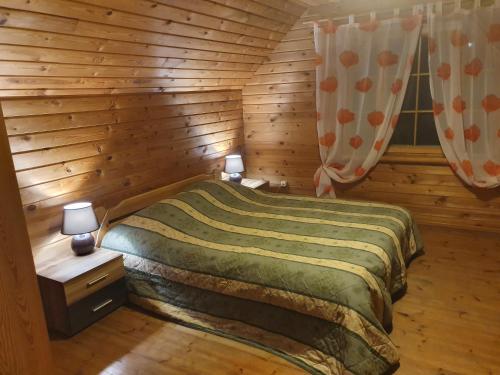 Postel nebo postele na pokoji v ubytování Holiday Home Dālderi