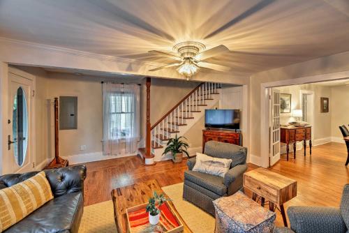 a living room with a couch and a table at New Bern Home with Yard, Grill and Walkable Location in New Bern