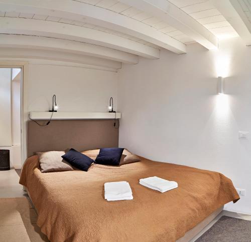 Een bed of bedden in een kamer bij Ca' Widmann