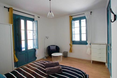 Postel nebo postele na pokoji v ubytování LOVELY FLAT FIRA MWC