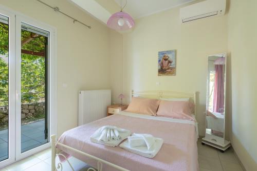Postel nebo postele na pokoji v ubytování Rania-apartments_2