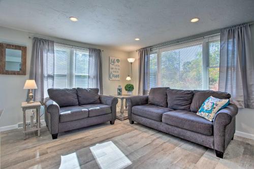 a living room with a couch and a chair at Updated Plymouth Home Less Than 2 Miles to Waterfront! in Plymouth