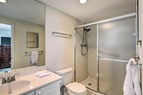 a bathroom with a shower and a toilet and a sink at Beachfront Condo with Pool Access in Hollywood! in Hollywood
