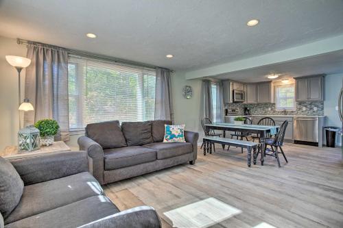 a living room with a couch and a table at Updated Plymouth Home Less Than 2 Miles to Waterfront! in Plymouth