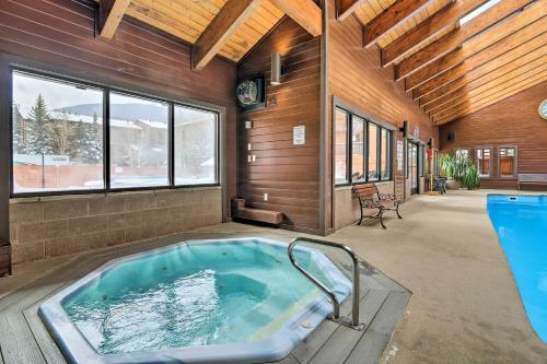 a jacuzzi tub in a room with at Ski and Relax Fireside Frisco Gem with Resort Perks! in Frisco
