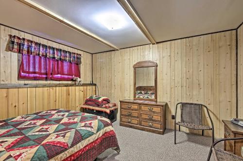 A bed or beds in a room at Black River Retreat 3 Mi to Powderhorn Mountain!