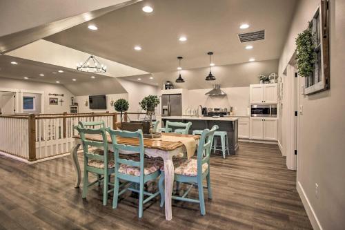 a kitchen and dining room with a table and chairs at Chic Farmhouse with Creek in Heart of Wine Country! in McMinnville