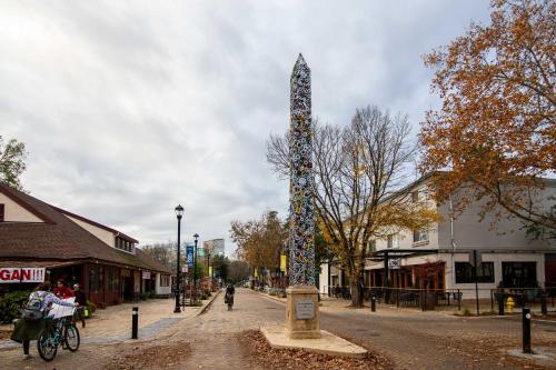 a tall sculpture in the middle of a street at Well-Appointed Condo Across Street from UC Davis! in Davis