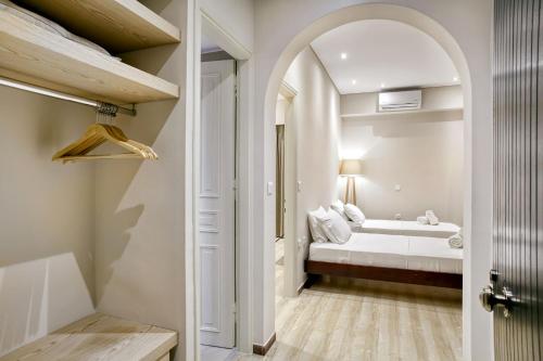 Ένα ή περισσότερα κρεβάτια σε δωμάτιο στο Villa Eftichia Hotel Apartments & Studios
