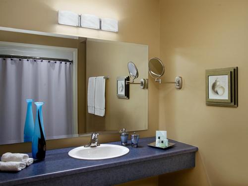 a bathroom with a sink and a mirror at Jordan House Hotel in Jordan