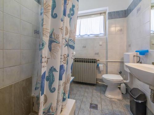 Koupelna v ubytování Apartment Roni