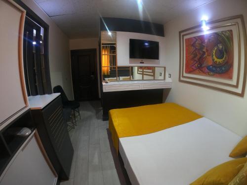 Ένα ή περισσότερα κρεβάτια σε δωμάτιο στο Exporoyal Hotel