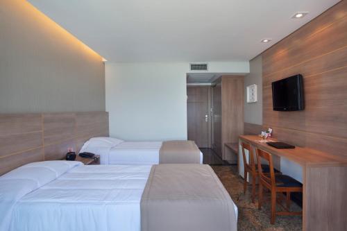 Katil atau katil-katil dalam bilik di Royalty Barra Hotel