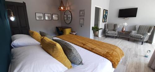 Katil atau katil-katil dalam bilik di La Roca Guest House