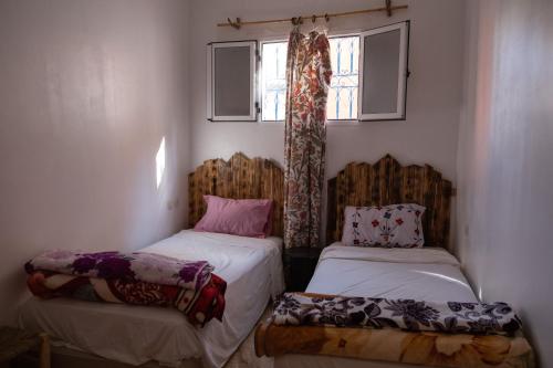 Katil atau katil-katil dalam bilik di Agachill Surf House