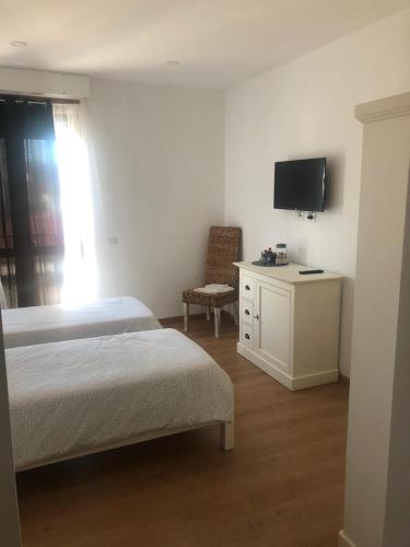 TV a/nebo společenská místnost v ubytování A casa di Titty