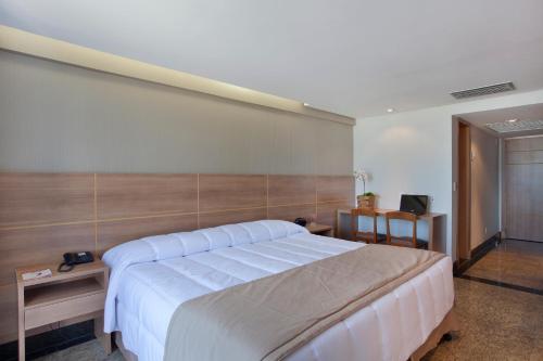 Katil atau katil-katil dalam bilik di Royalty Barra Hotel