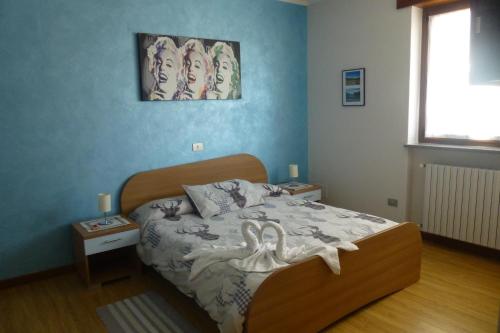 Ένα ή περισσότερα κρεβάτια σε δωμάτιο στο B&B La Beula