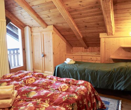Cama ou camas em um quarto em Appartamenti De Betta