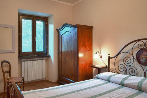 Katil atau katil-katil dalam bilik di Agriturismo Zafferano e Dintorni