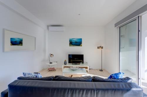 מיטה או מיטות בחדר ב-Apartment with Stunning Seaviews