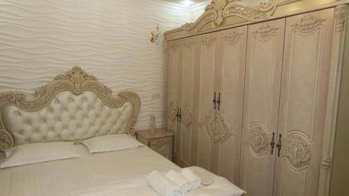 Cama o camas de una habitación en Primestay Samarkand Residences