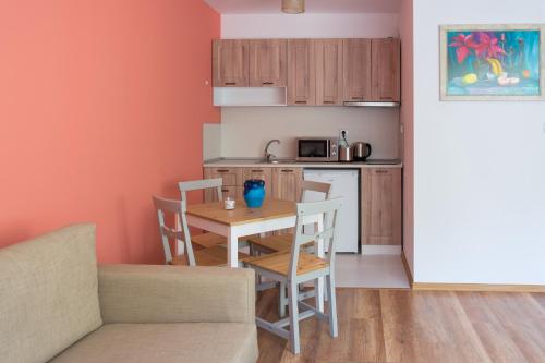 Η κουζίνα ή μικρή κουζίνα στο Rebus Apartments