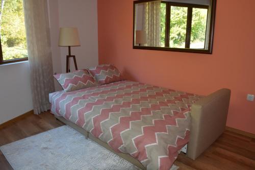 Ένα ή περισσότερα κρεβάτια σε δωμάτιο στο Rebus Apartments
