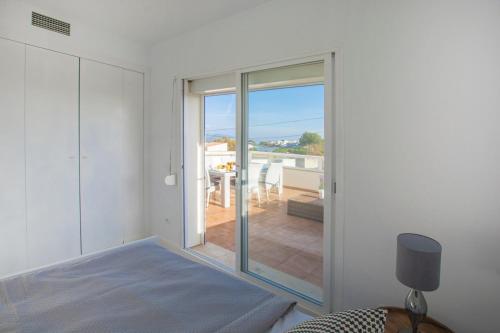 Ένα ή περισσότερα κρεβάτια σε δωμάτιο στο MARINA SEA
