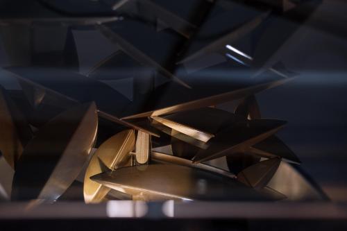 a pile of wooden objects on a table at Deluxe Jacuzzi Apartment by LIUKSAI in Klaipėda