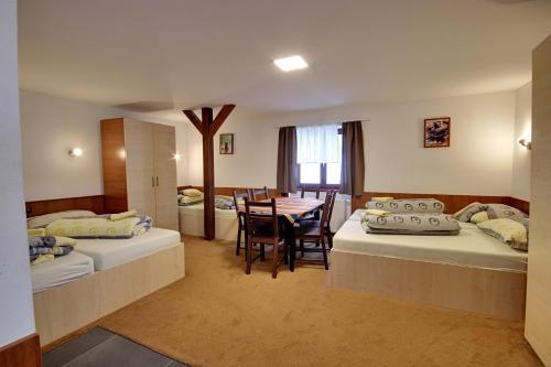 Postel nebo postele na pokoji v ubytování Apartmany Kadleců