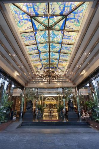 a large building with a stained glass ceiling at The Royal Surakarta Heritage - Handwritten Collection in Solo