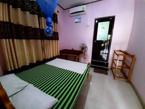 Cama o camas de una habitación en Gal Oya Lake View Inginiyagala