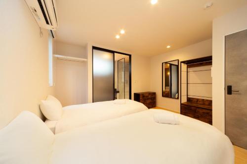 Postel nebo postele na pokoji v ubytování Villa Rochalie by HHG