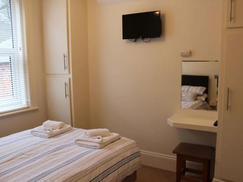 A television and/or entertainment center at Apartment 6 