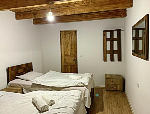 Postel nebo postele na pokoji v ubytování Old City Hotel