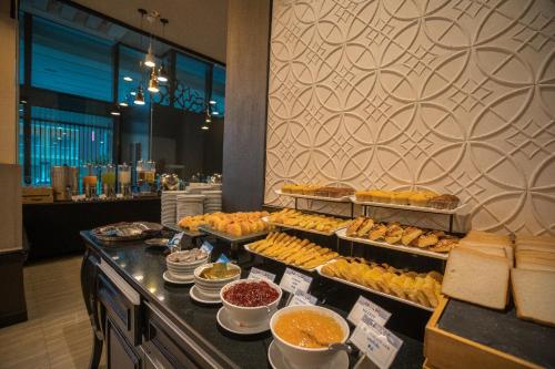 a buffet line with many different types of pastries at TSix5 Quarter in Pattaya North